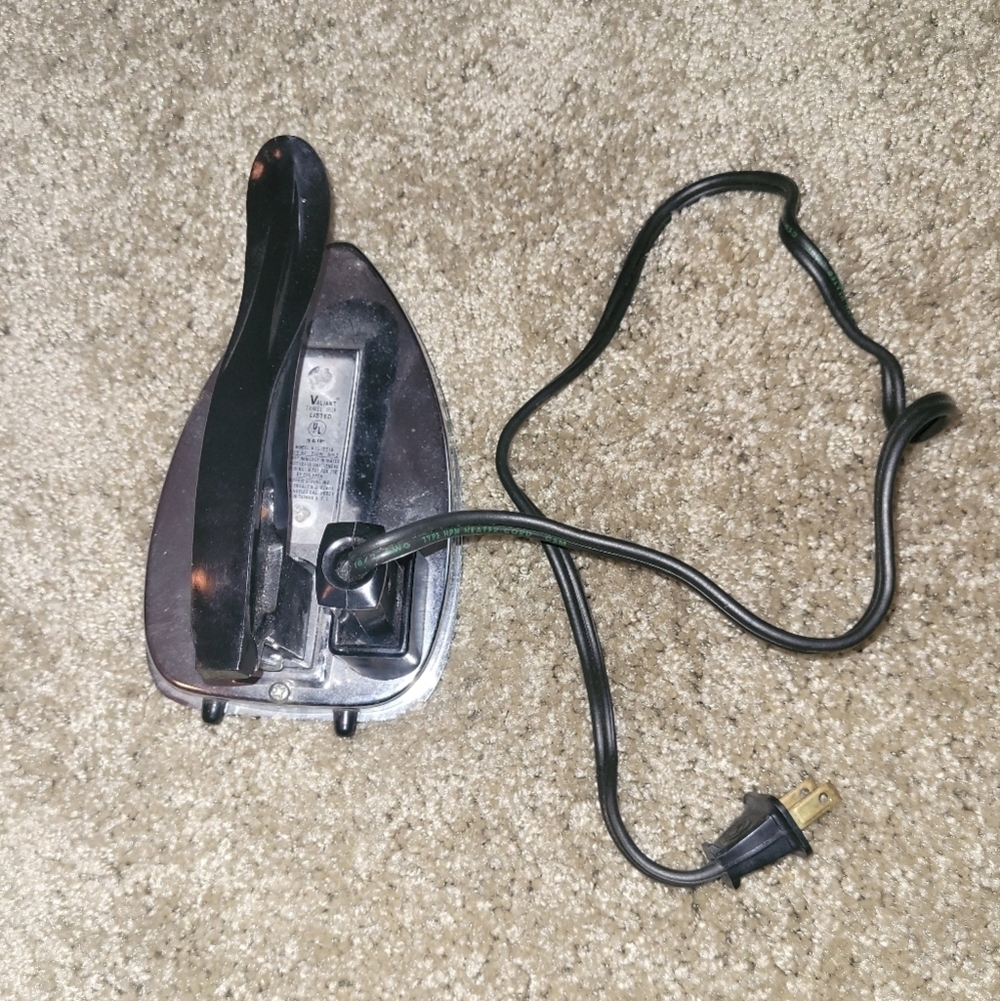 Vintage electric traveling iron.